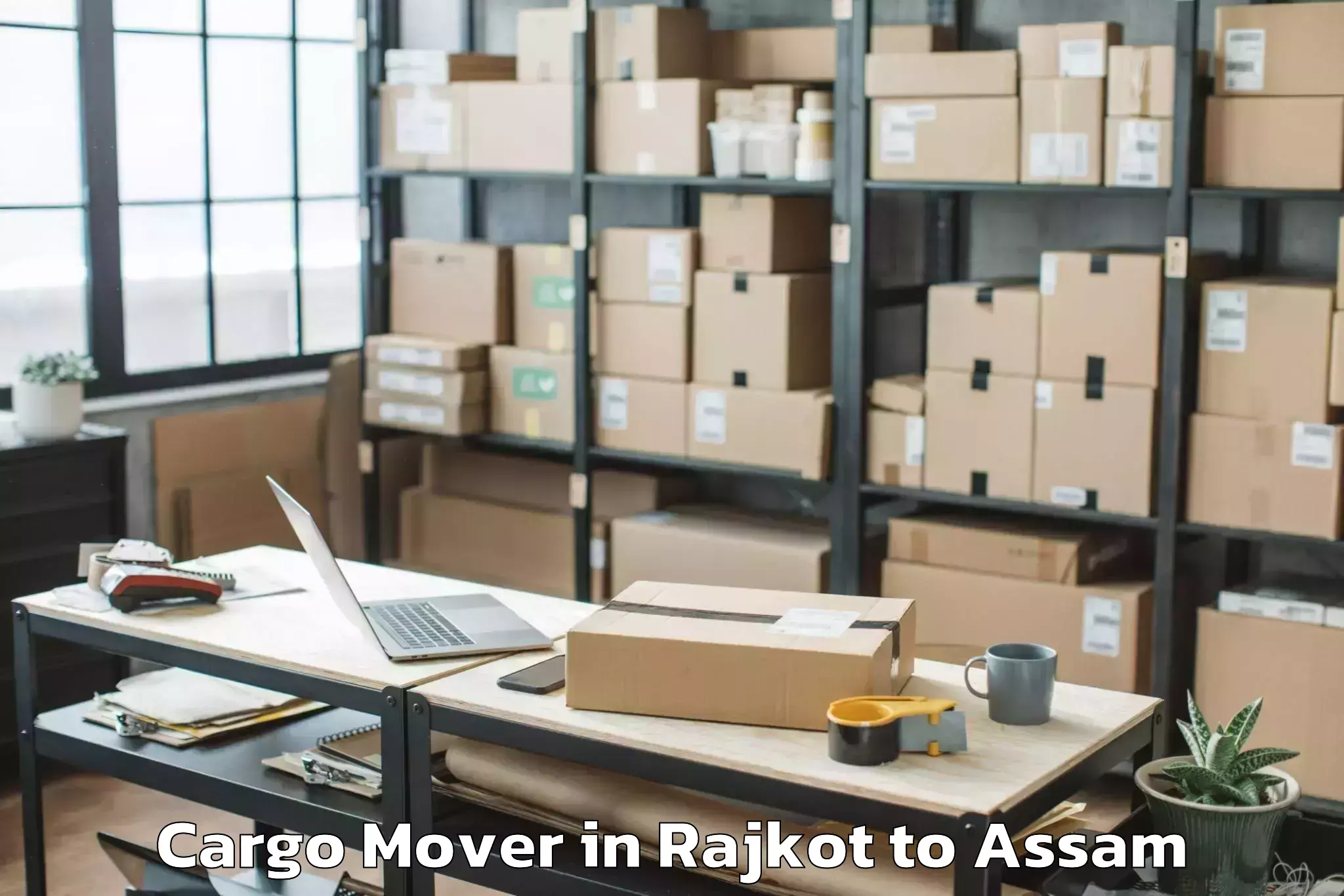 Reliable Rajkot to Marigaon Cargo Mover